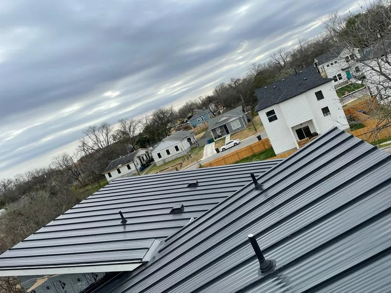 Standing seam metal roof panels with vents for Skylight Repair in Macomb